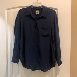 L’Agence 100% silk navy button up blouse.